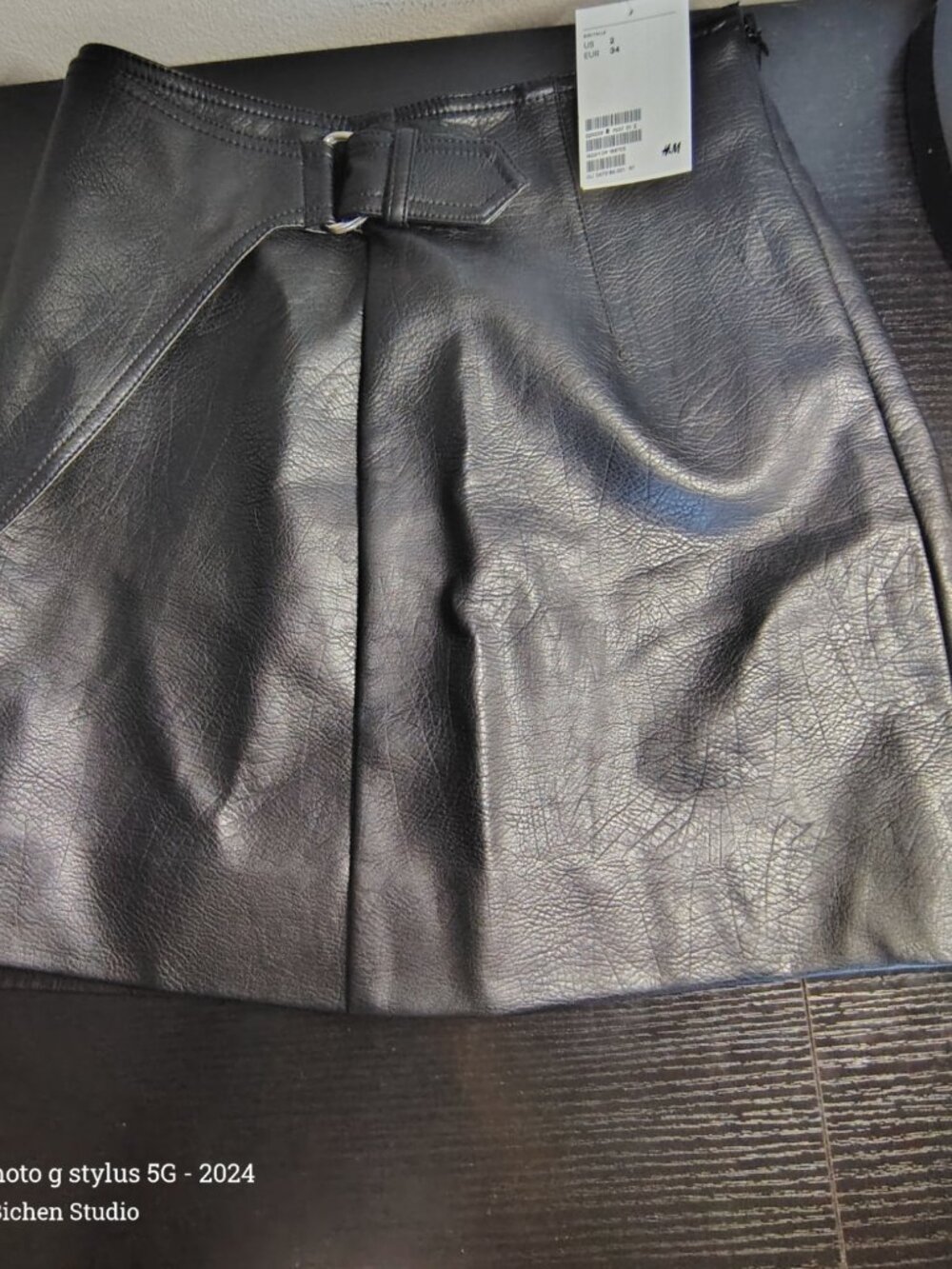 H&M Black Faux Leather Mini Skirt with Buckle Detail